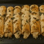 Keto Chicken Bacon Ranch Roll-Ups filled with creamy ranch chicken, crispy bacon, and melted cheese.