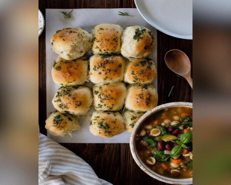 Keto homemade dinner roll-ups baked golden with cheesy, savory filling inside.