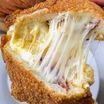 keto high protein calzone with melted cheese pull and crispy golden crust