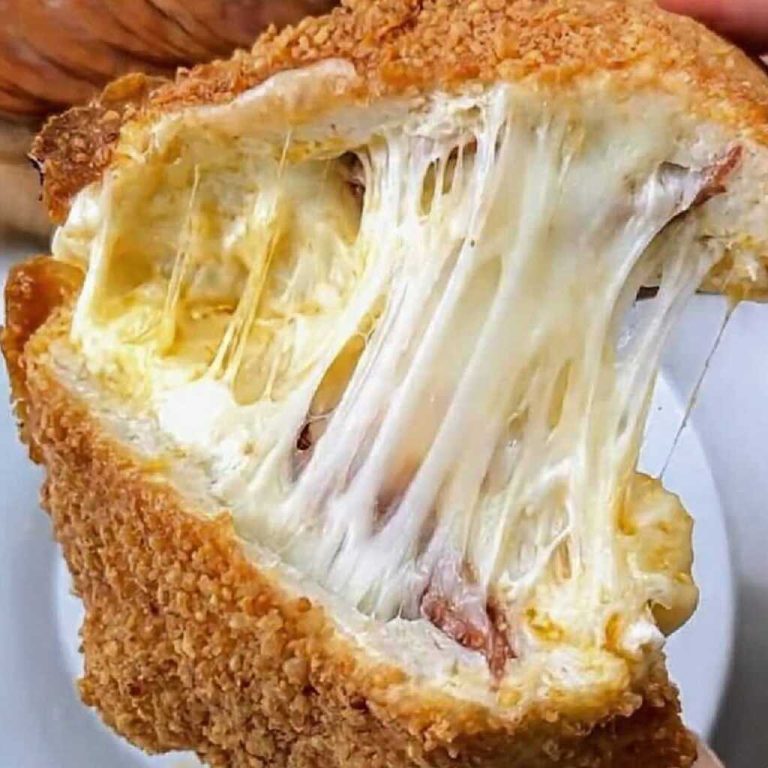 keto high protein calzone with melted cheese pull and crispy golden crust