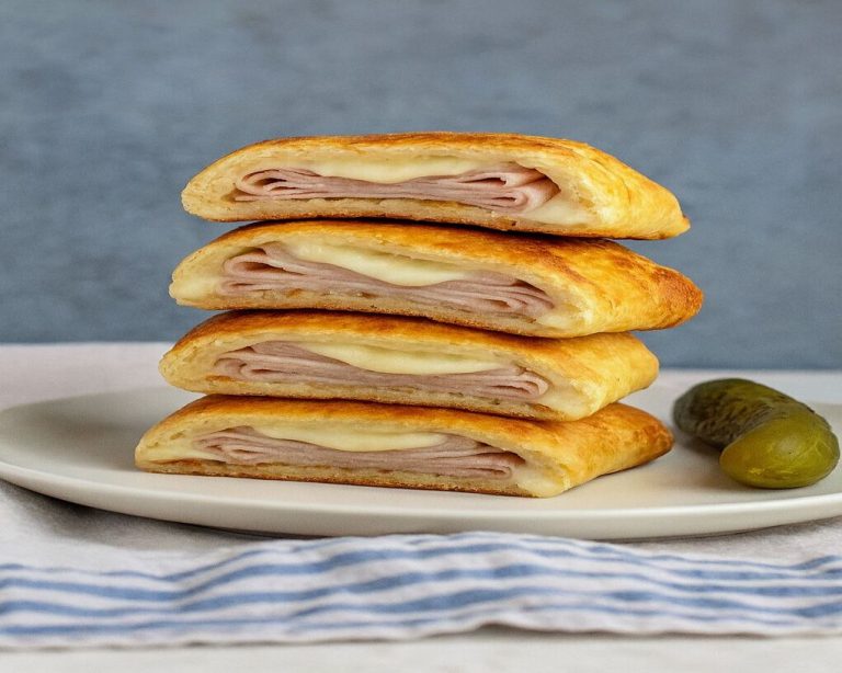 “Keto Hot Pockets made with golden low-carb dough, stuffed with melted cheese and savory fillings.”