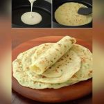 Soft keto garlic butter flatbread brushed with melted butter, garlic, and parsley.