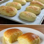 Golden keto soft and fluffy dinner rolls baked on a tray and served warm