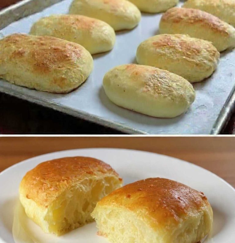 Golden keto soft and fluffy dinner rolls baked on a tray and served warm