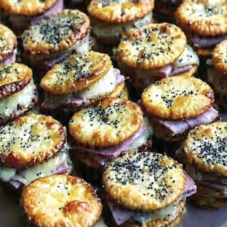 keto cracker sandwich with turkey ham swiss cheese and poppy seeds